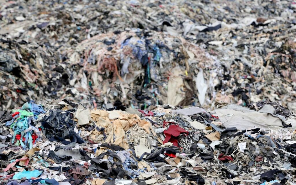 We Throw Away 92 Million Tons of Textiles Every Year - Clothing Landfill - Another Green Story